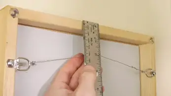 How to Hang a Picture With Wire